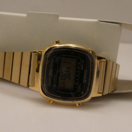 Casio LA670WGA-1UR Womens Black Digital Watch with Gold Band