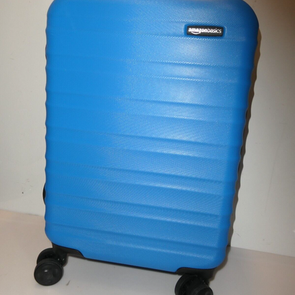 Amazon Basics Hardside Expandable Spinner Suitcase, Light Blue, 55cm Carry-On