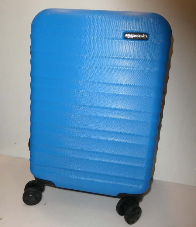 Amazon Basics Hardside Expandable Spinner Suitcase, Light Blue, 55cm Carry-On